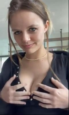 Taking off her top